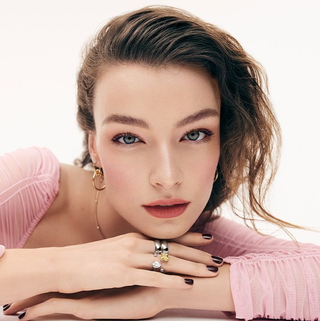 Model removing makeup with our gentle yet powerful Soothing Cleansing Oil